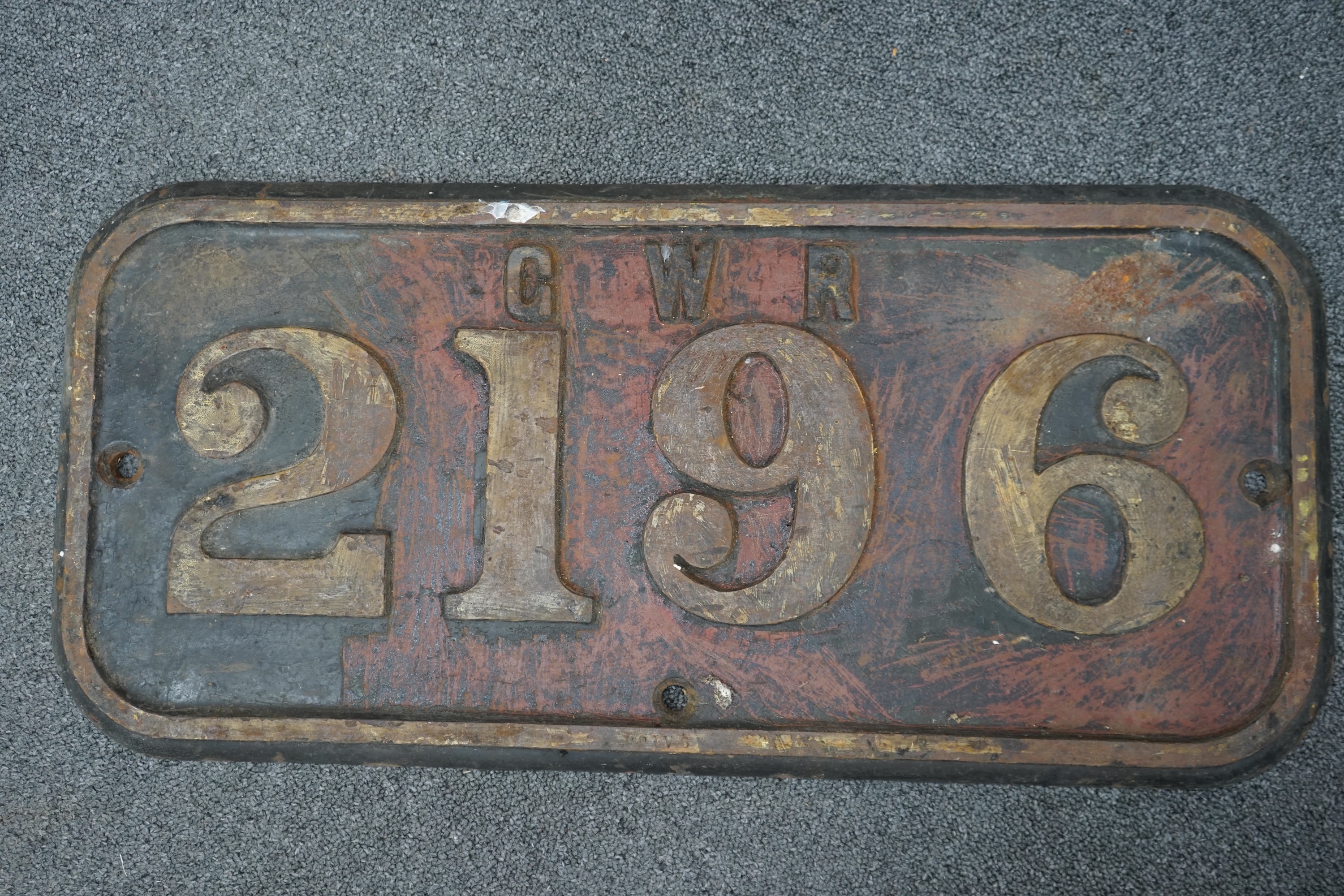 A cast iron GWR locomotive cab side number plate for an 0-6-0ST locomotive, ‘Gwendraeth’ 2196, built in 1906 by the Avonside Engine Company for the Burry Port and Gwendraeth Valley Railway, withdrawn by BR in 1956, dimen